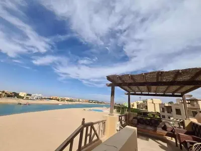a view of the beach from the balcony of a resort at Sabina Y97- 23 in Hurghada