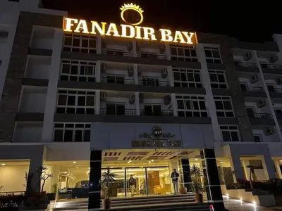 a building with a sign that reads familiar bay at Fanadir Bay Resort in Hurghada
