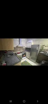 a kitchen with a sink and a counter top at GZ Resort in Hurghada