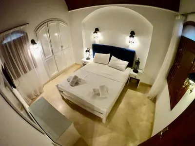 a bedroom with a bed in a room with lights at Villa 3bedroom in new years in Hurghada