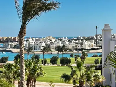 a view of a city from a resort with palm trees at luxury ancient stands resort one bedroom in Hurghada