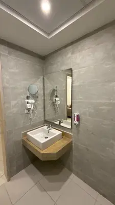 a bathroom with a sink and a mirror at Sky Star Hotel free shuttle to Hurghada City Center in Hurghada