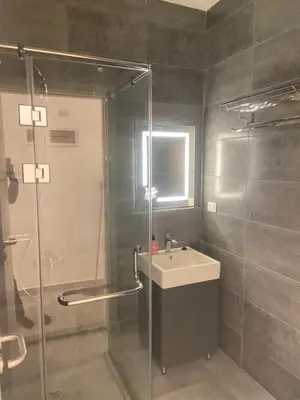 a bathroom with a sink and a shower at Studio Imperial resort pool view in Hurghada