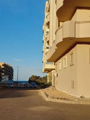 a building on the side of a street at Wohnung in Al Ahyaa Hurghada in Hurghada