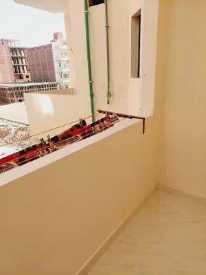 a room with a window with a train on a ledge at Wohnung in Al Ahyaa Hurghada in Hurghada