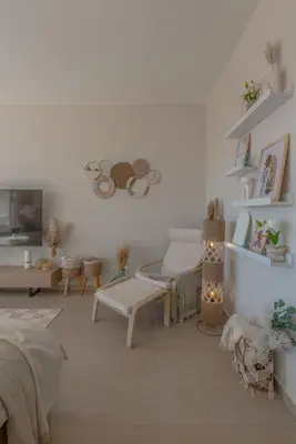 a white living room with a couch and a chair at Stylish 3 BR Retreat at Ancient Hills El Gouna in El Gouna