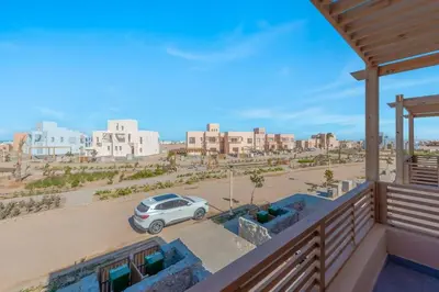 a car parked in a parking lot on a balcony at Stylish 3 BR Retreat at Ancient Hills El Gouna in El Gouna