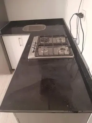 a stove top oven sitting in a kitchen at Good place to enjoy vacation in Hurghada