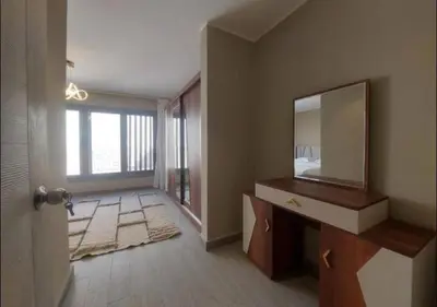 a bathroom with a mirror and a sink and a mirror at Comfort 3BR Apartment C1-D with Private Heated Pool at Bali Elgouna in Hurghada
