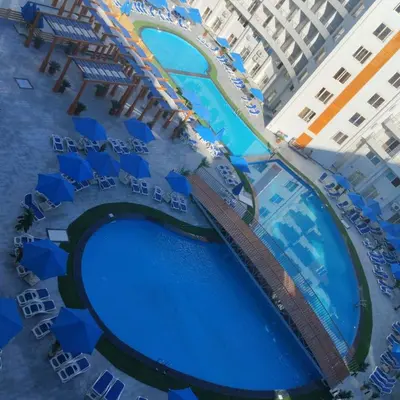 an aerial view of a pool at a resort at Golden Tayeb Hurghada Compound in Hurghada