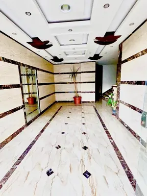 an empty room with plants on the walls at Fanta Sea Studio with private jacuzzi - Al Ahyaa in Hurghada