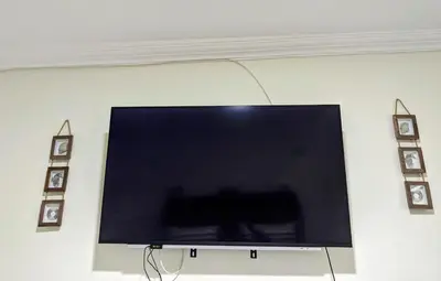 a flat screen tv hanging on a wall at Fanta Sea Studio with private jacuzzi - Al Ahyaa in Hurghada
