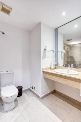 a bathroom with a toilet and a sink at Studio in a touristic area - Al mamsha in Hurghada