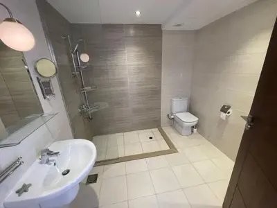 a bathroom with a sink and a toilet at GCribs in Hurghada