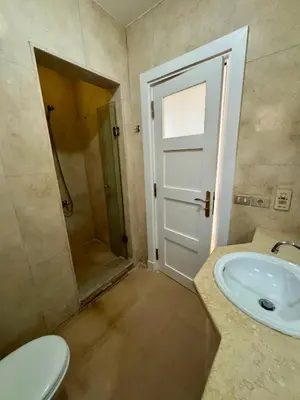 a bathroom with a toilet and a sink and a shower at G20-1-5 El golf in Hurghada