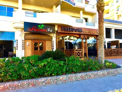 a restaurant in front of a hotel building at Florenze Khamsin Hurghada in Hurghada