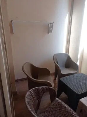 a room with chairs and a table and a table and chairs at Florenze Khamsin Hurghada in Hurghada