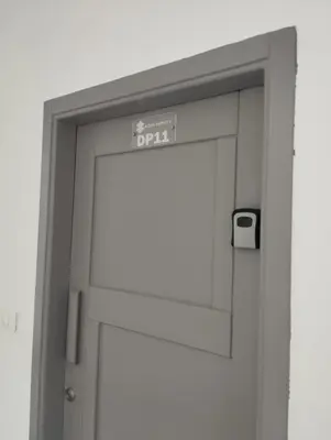 an open door with a sign on it at Studiowohnung Aqua Infinity in Hurghada