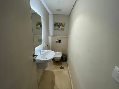 a bathroom with a sink and a toilet at SunShine Mangroovy-M10 in Hurghada