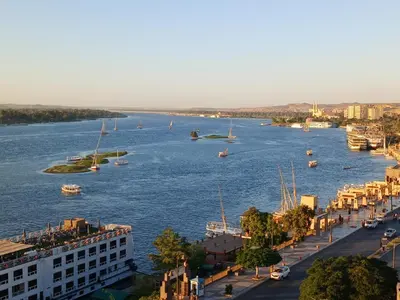 a view of a river with boats in it at Monty Homestay in Aswan