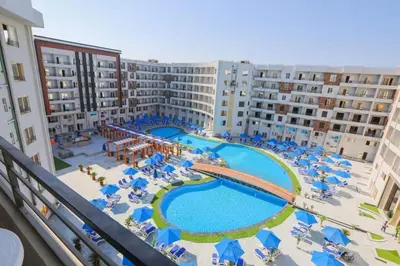 an aerial view of a hotel with a swimming pool at Tiba Golden Resort in Hurghada