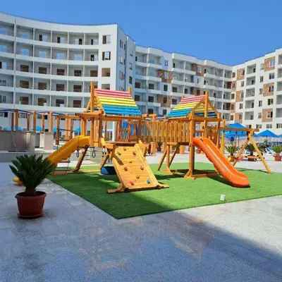 a playground with a slide and a slideintend at Tiba Golden Resort in Hurghada