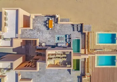 an aerial view of a house with a building at Ancient Hill 3BR Gouna Sea View & Priv Roof Pool in El Gouna