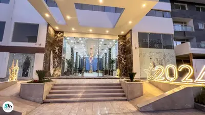 a building with a sign in front of it at Scandic Resort Hurghada in Hurghada