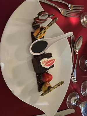 a white plate with different types of desserts on it at Villa Shams El Bahr in Hurghada