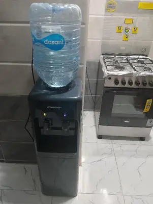 a plastic container on top of a blender next to a stove at Fanadir bay in Hurghada