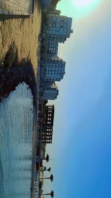 an aerial view of a row of buildings next to the water at Scandic Resort Hurghada in Hurghada