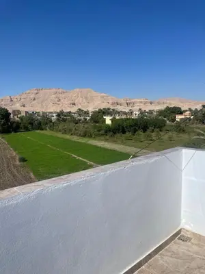 a view of the desert from the roof of a house at Tonys Flat in Al Aqālitah