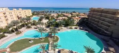 an aerial view of the pool at the resort at Home always in Hurghada