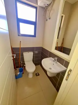 a bathroom with a toilet and a sink at Elgouna, Tawila island in Hurghada