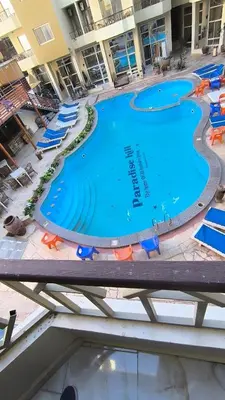 an overhead view of a swimming pool at a hotel at Paradise Hill 207 in Hurghada