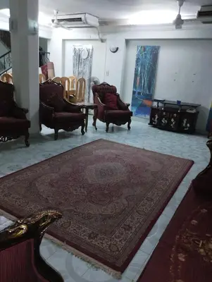 a living room with chairs and a rug on the floor at جبل تقوق فيلا عبدالله محروس in Aswan