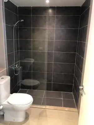 a bathroom with a toilet and a shower at Luxury stay in El Gouna