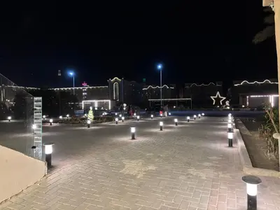 a group of lights in a parking lot at night at البلكان بيتش ريزورت Balkan Beach Resor in Hurghada