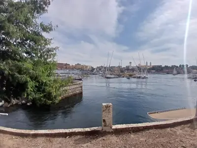 a view of a harbor with boats in the water at Nile Moon in Jazīrat Aswān