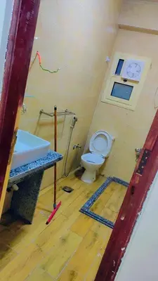 a bathroom with a toilet and a sink at Hurghada in Hurghada