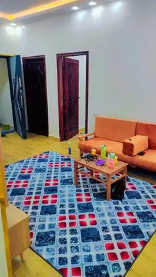 a living room with a couch and a table at Hurghada in Hurghada