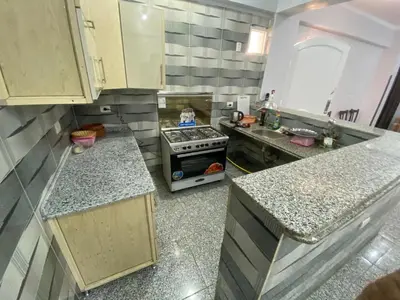 an overhead view of a kitchen with a stove at Tokyo House Luxor in Luxor