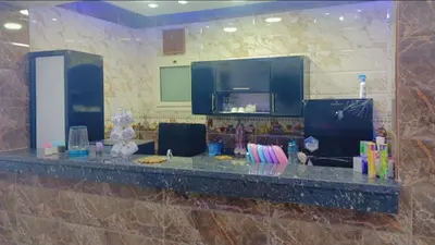 a counter in a kitchen with a counter top at أهلا بكم in Luxor