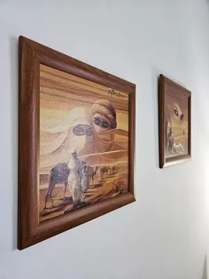 a picture of a painting on a wall at Sheraton Plaza 218 in Hurghada
