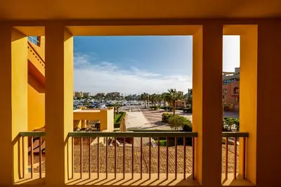a view of the harbor from a balcony at 2BR New Marina Bliss • Cozy Centered Stay in Hurghada