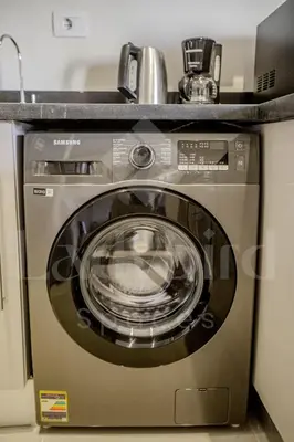 a washing machine with a counter on top of it at Ladybird - Veranda Celestia in Hurghada