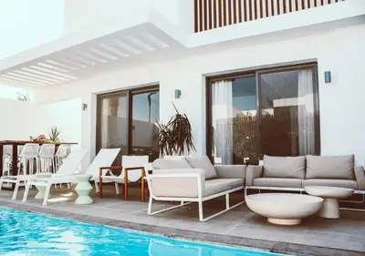 a villa with a swimming pool and a patio at El Gouna 3 Bedroom in Sholan in Hurghada