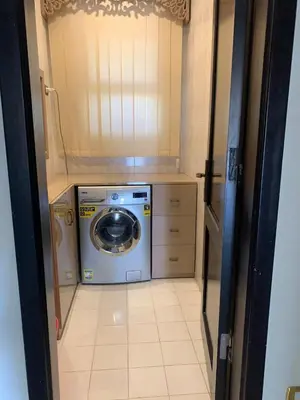 a washer and dryer in a small room at Al-Kiam Villa Private pool A F in Hurghada