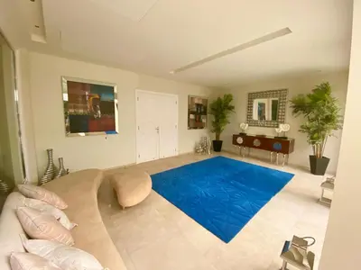 a large living room with a large blue rug at Abu Tig Marnia El Gouna MB04 in Hurghada