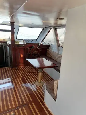a view of the inside of a boat with a table at Zafeer in Hurghada